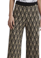 PANTALONI Nero/oro Cafenoir
