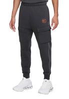 PANTALONI Grigio/arancio Nike