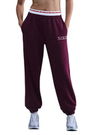 PANTALONI Prugna Nike