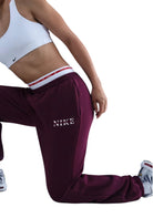 PANTALONI Prugna Nike