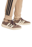 PANTALONI Beige/nero Adidas
