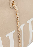 ACCESSORI LIFESTYLE Beige/oro Guess