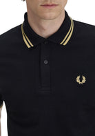 MAGLIONI E POLO Nero/oro Fred Perry