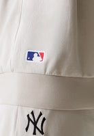 FELPE Beige/nero New Era