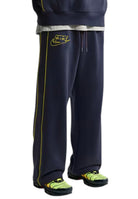 PANTALONI Blu/giallo Nike