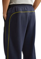 PANTALONI Blu/giallo Nike